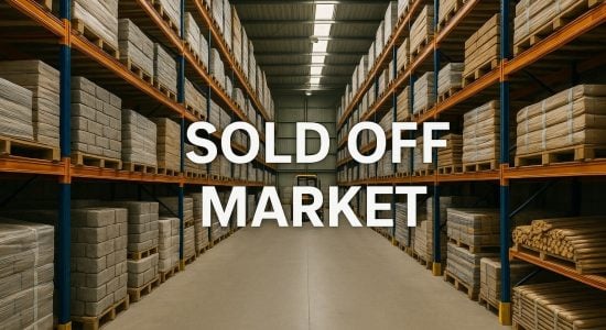 Warehouse shelves stacked high, Sold Off Market text